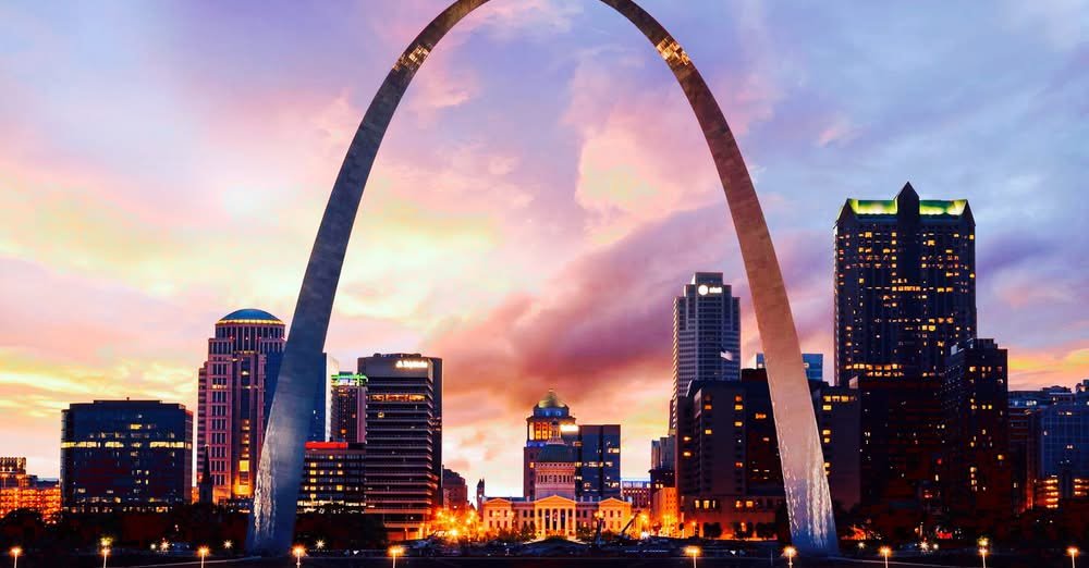 St. Louis Gateway Arch at sunset with city skyline- St. Louis City Guide