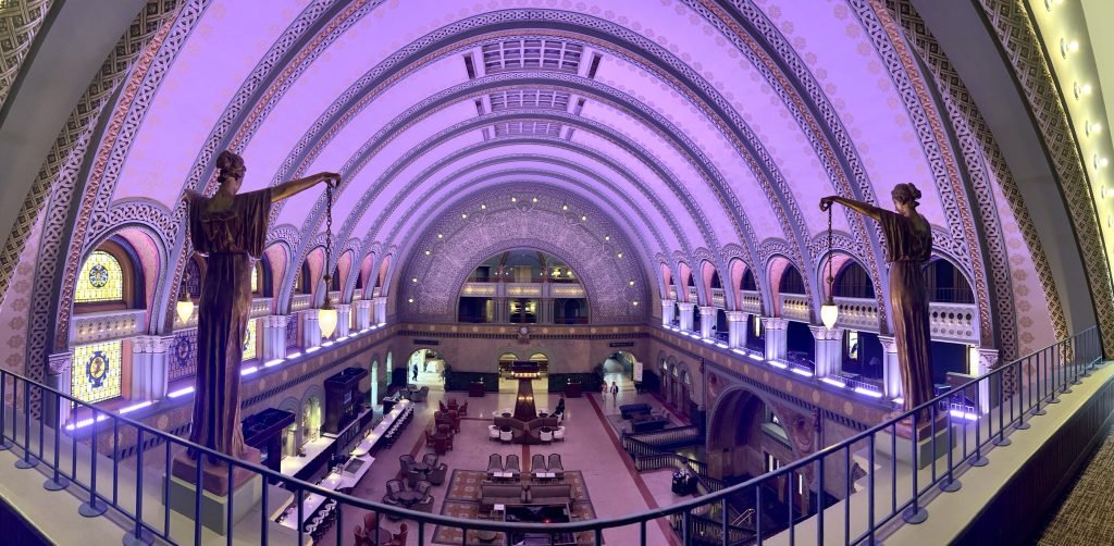 Interior view of the Grand Hall at St. Louis Union Station with arched ceiling and statues