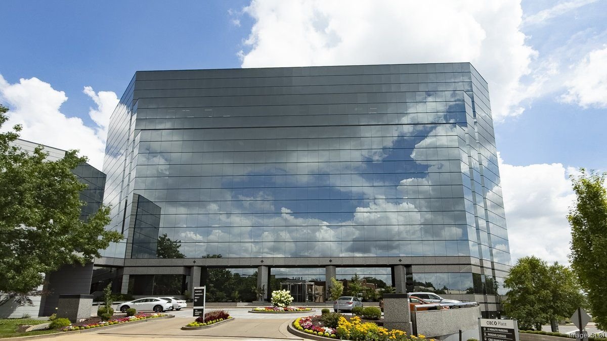 CIBC Place office building at 1401 S. Brentwood Blvd. in St. Louis County, featuring reflective glass windows under a partly cloudy sky.
