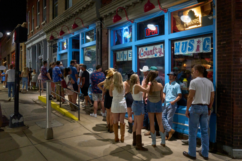 Crowd lined up outside The Honky Tonk STL for a night of live country music in downtown St. Louis