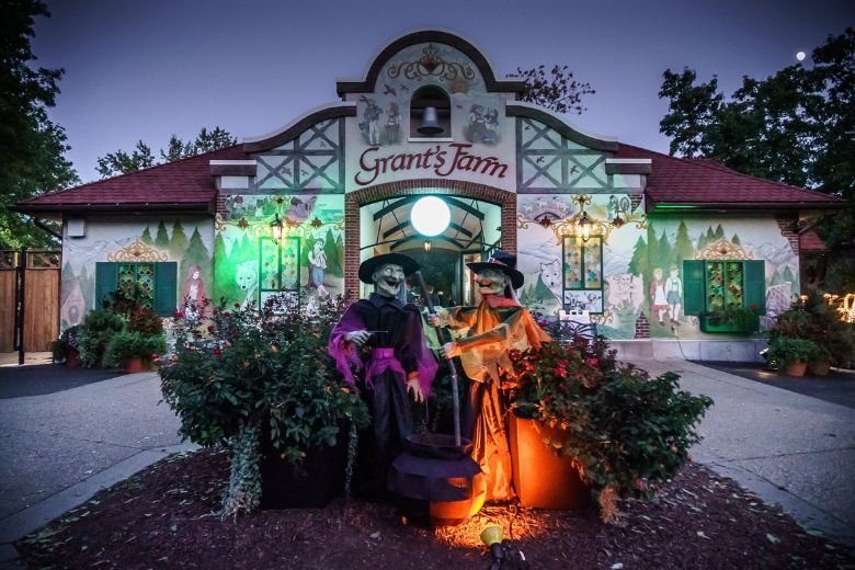 Front entrance of Grant’s Farm decorated with Halloween lights, skeletons, and pumpkins for Halloween Nights 2025 in St. Louis